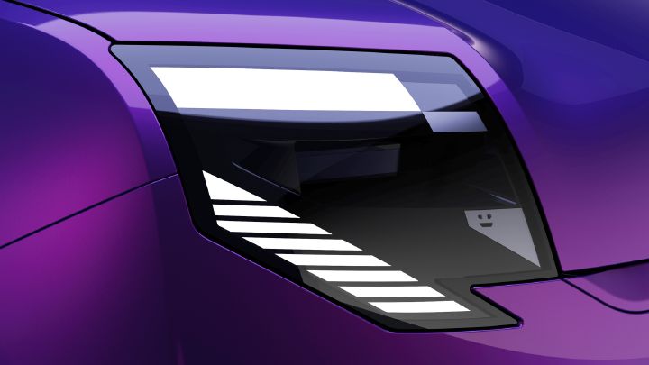Illustration numérique montrant un gros plan de l’extérieur d’un véhicule violet, centré sur un phare avant. Les reflets géométriques blancs, le panneau gris incrusté représentant un visage de robot, les contours marqués et les lignes fluides de carrosserie soulignent le design épuré de ce concept-car.