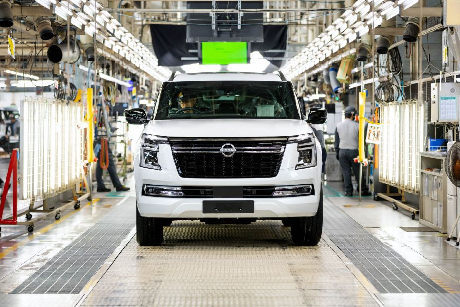Front view of a white 2027 Nissan Y63 Patrol on the production line at Nissan's manufacturing facility