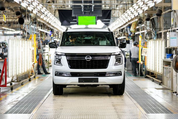 Front view of a white 2027 Nissan Y63 Patrol on the production line at Nissan's manufacturing facility