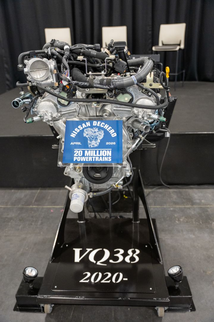 A VQ38 engine on display with a plaque that reads “Nissan Decherd, April 2026, 20 million powertrains.”