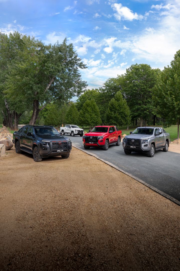 The 2026 Navara is available in four comprehensively equipped grades. SL (shown in Alpine White), ST (Shown in Summit Silver ), ST-X (shown in Outback Red) and PRO-4X (shown in Boulder Grey).