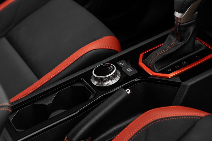 2026 Nissan Navara PRO-4X finished in Boulder Grey featuring a console macro with terrain dial, electronic parking brake, twin cupholders and gear selector