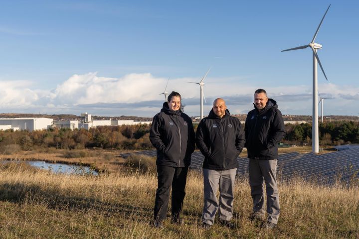 Rewilding project managers standing in marshland