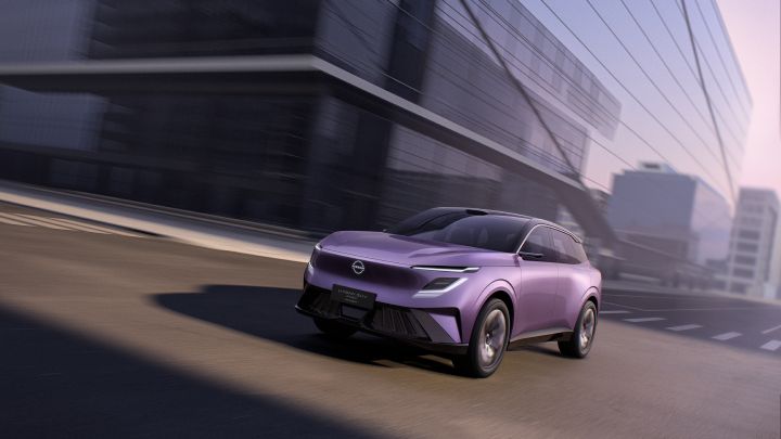 An Urban SUV PHEV Concept driving on an elevated city roadway. A purple-toned SUV faces forward, moving from right to left, with modern buildings in the background.
