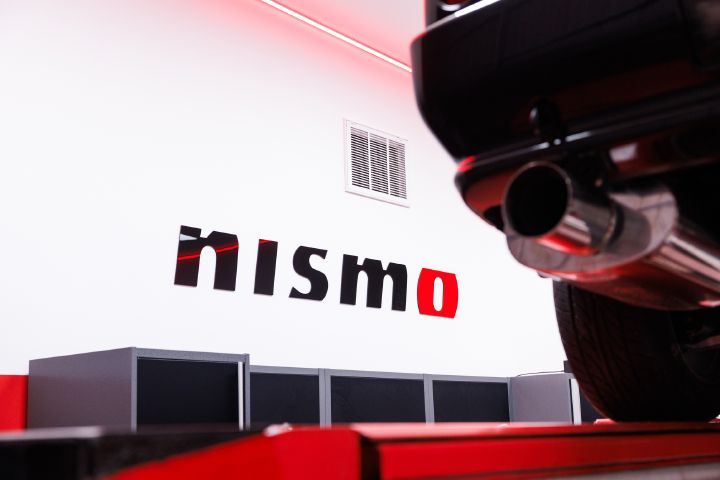 A NISMO sign in the workshop of the new NISMO Performance Centre Melbourne.