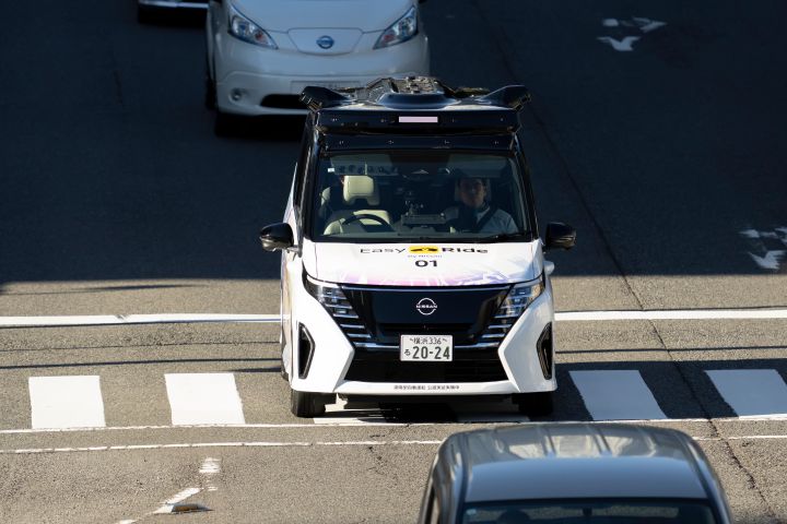 Driverless vehicle is driving on a public road.