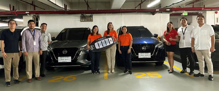 A group photo of representatives from Sales Team and Zoetis during the turn over of the Nissan Kicks e‑POWER.