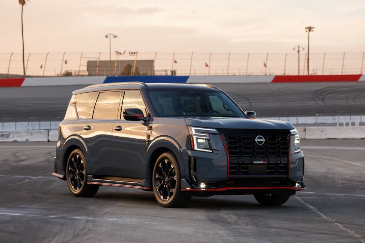 Front right 3/4 view of the 2026 Nissan Armada NISMO parked on a racetrack.