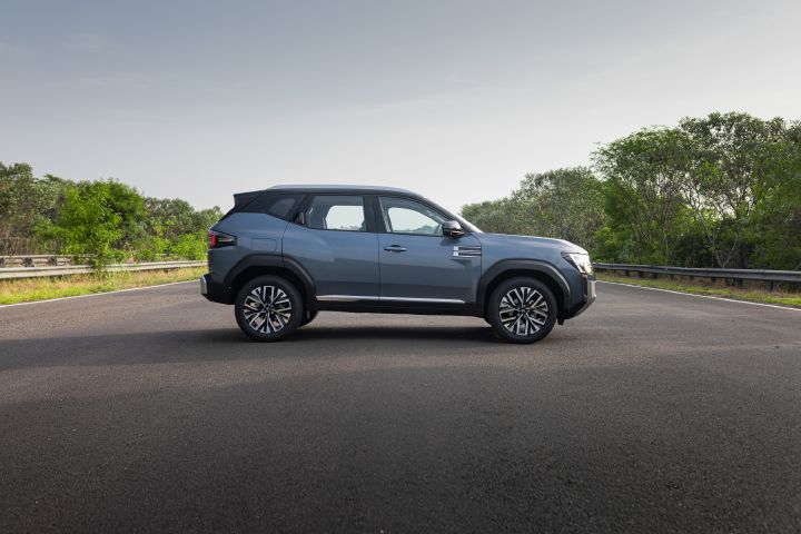 Side profile of the Nissan Tekton displaying its proportions, character lines and elevated stance.