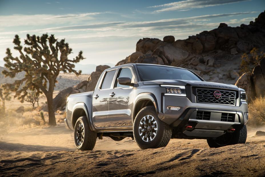 A truck driving through the desert.