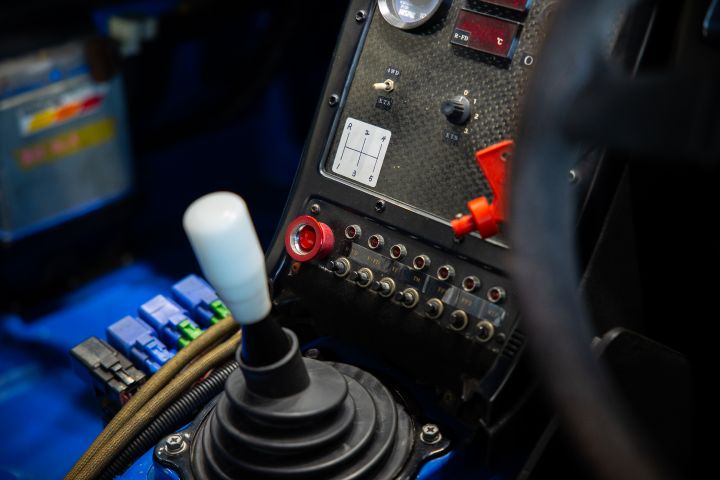 The shift lever inside a blue NISMO GT‑R Race car.
