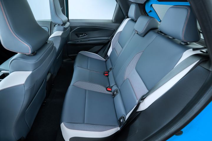 view of Micra rear passenger seats from left side door pov – high