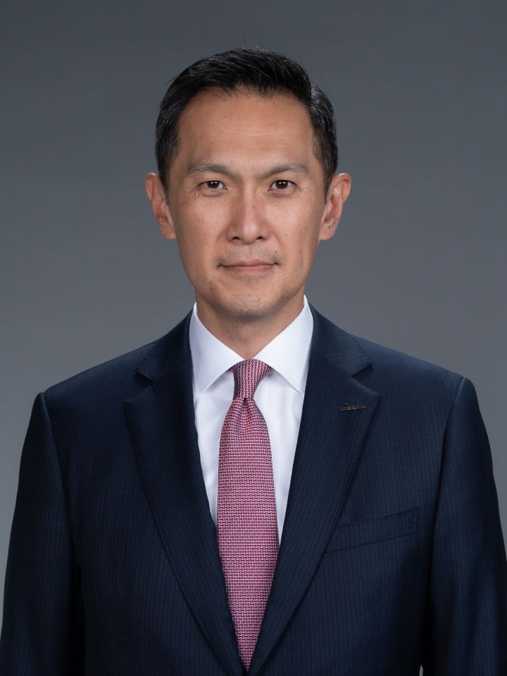 Portrait of Stephen Ma (suit, tie and NISSAN corporate pin) (front)