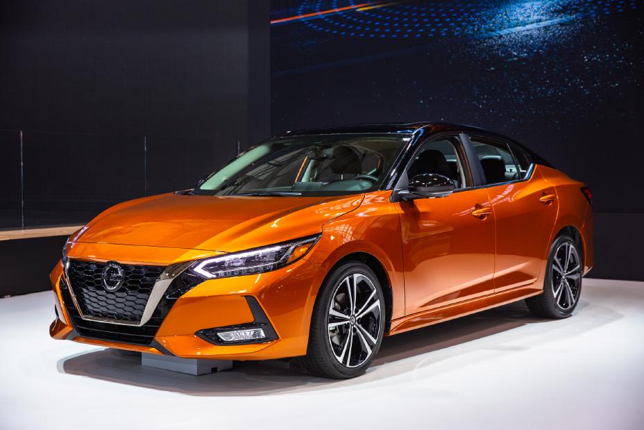 An orange 2020 Nissan Sentra on display