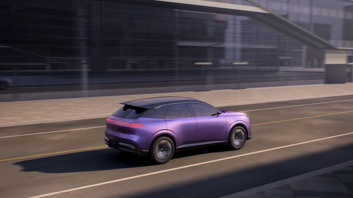 A purple Urban SUV PHEV Concept driving to the right on a city road, with buildings in the background and slight motion blur indicating movement.