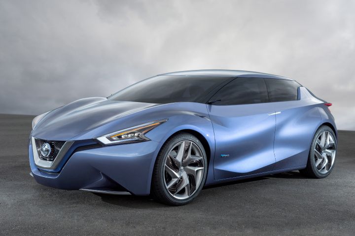 a side profile view of a parked Nissan Friend-ME Concept sedan