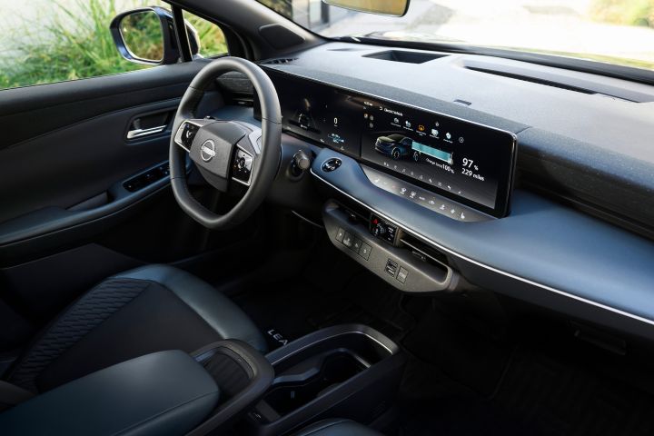 The steering and dashboard inside the 2026 Nissan LEAF.