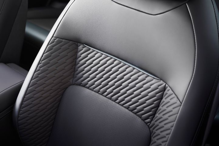 The black back rest of the 2026 Nissan LEAF interior seat.