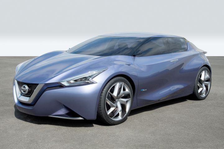 a side and side profile view of a parked Nissan Friend-ME Concept sedan