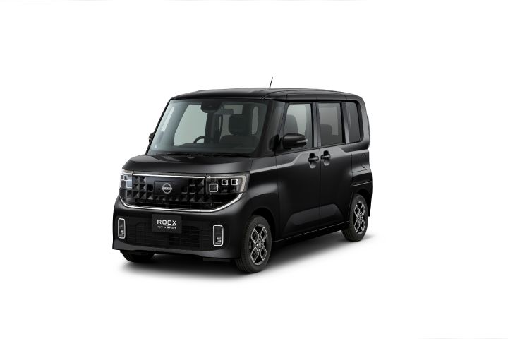 A black (body color) new Nissan Roox kei car (Highway Star) is positioned facing slightly to the front-left against a plain white background.