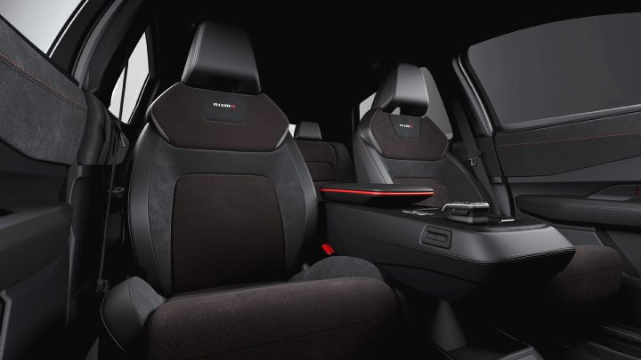 Interior of the Ariya NISMO, showing the seats with the NISMO logo on them