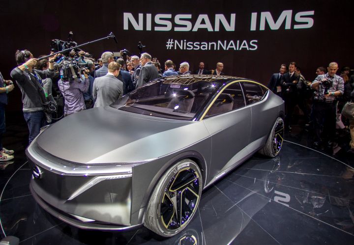 Denis Le Vot being interviewed in front of Nissan IMs