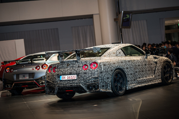 TOKYO (November 19, 2013) - On a stage, under lights and before the flash of cameras, the new Nissan GT-R and GT-R NISMO bowed on the eve of the Tokyo International Motor Show.