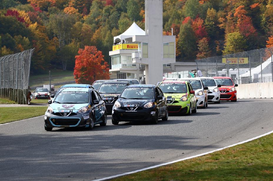 A group of Nissan Micra racing