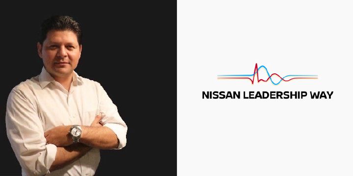 Fotos de executivo de camisa branca de braços cruzados com logo do Nissan Leadership Way