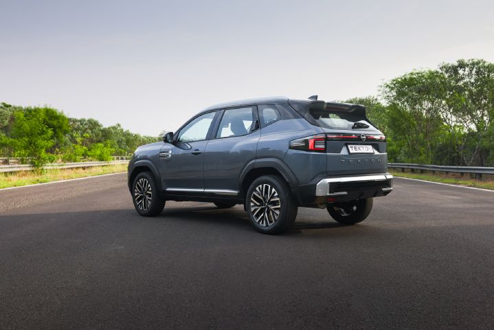 Rear three-quarter view of the Nissan Tekton featuring sculpted bodywork, alloy wheels and LED rear lights.