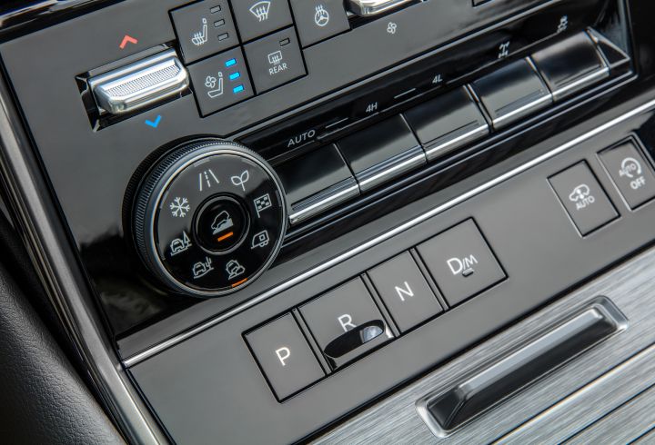 Close up of the center dashboard controls and button gear shift inside the 2025 Nissan Armada.