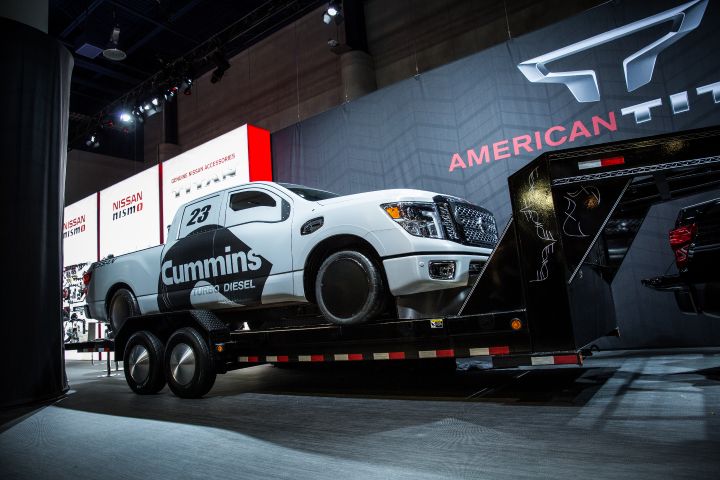 2016 Nissan TITAN XD on back of trailer