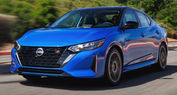 2024 Nissan Sentra driving down the road.