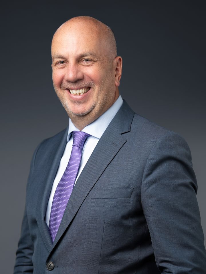 Portrait of Timothy Ryan (suit, tie)