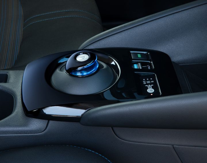 Close up of the park control gear shift area inside the 2025 Nissan LEAF.