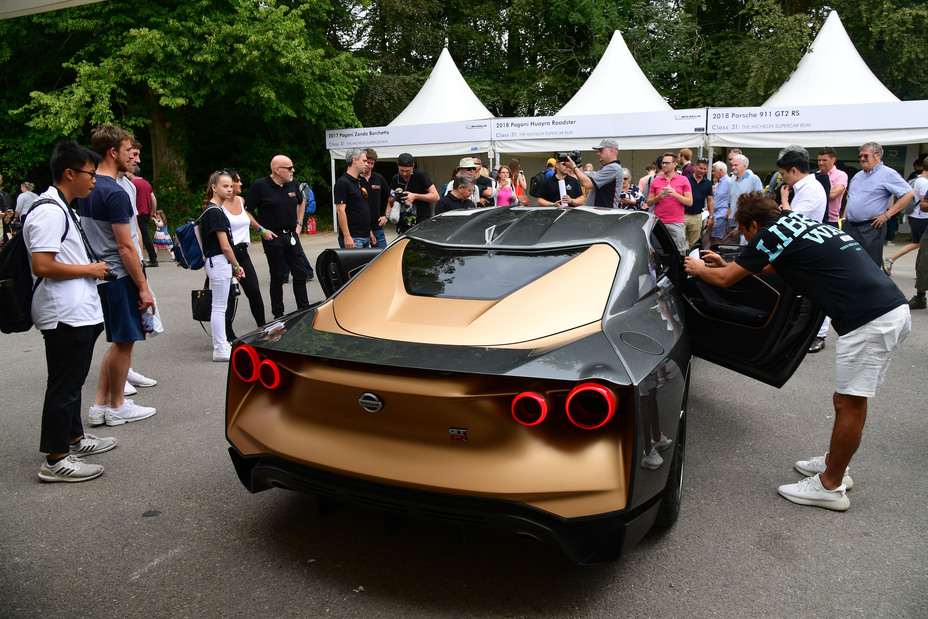 Attendees checking out the Nissan GT-R 50 at its debut