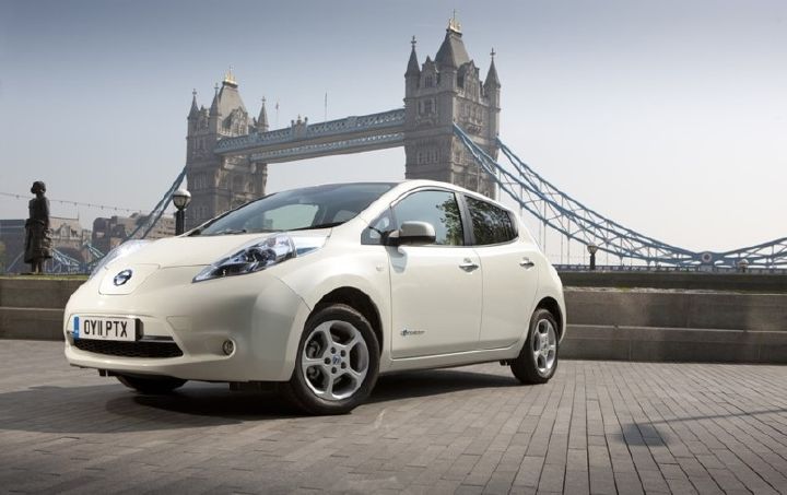 Nissan Leaf car colour cream front 3 quarter with London Tower Bridge behind