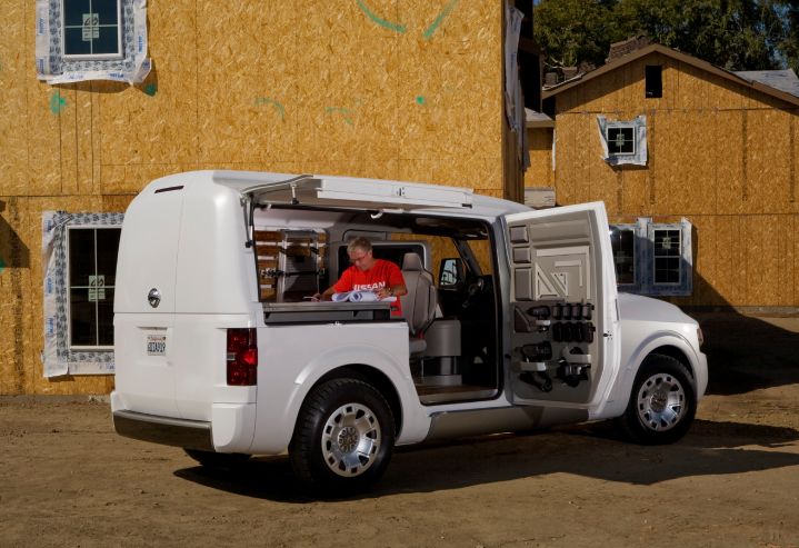 Exterior view of a man inside a NV2500 Concept working.