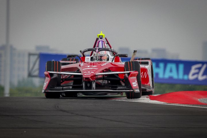 Front on shot of Norman Nato in the #17 car in Shanghai with blue Formula E branding in the background.