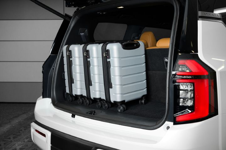 Three suitcases in the trunk of the 2026 Nissan Armada.