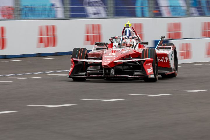 Front on shot of Norman Nato in the #17 Nissan Formula E Team car with ABB white advertising boards behind and to the side of the car.