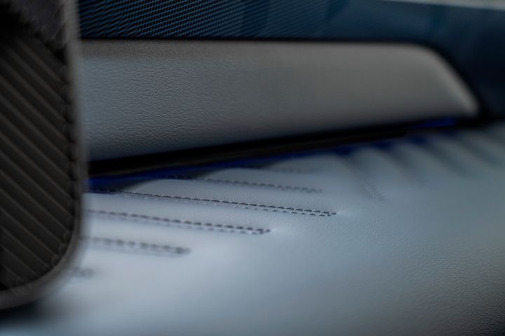 detailed shot of leather stitching and texture on dashboard