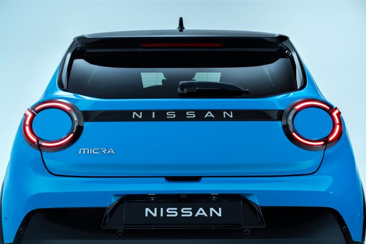 Rear view of Micra showing rear headlamps, Micra logo, Nissan logo and trunk door
