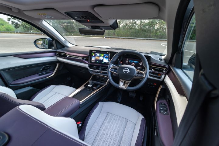 Panoramic interior view showcasing the Tekton’s front seats, dashboard and spacious cabin layout.