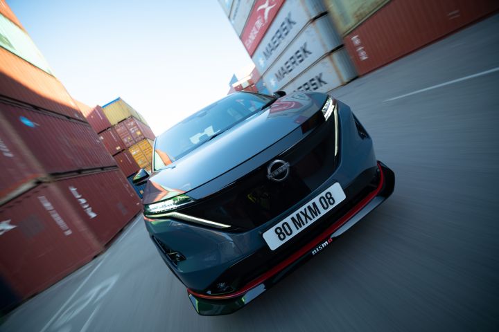 Close-up dynamic shot of the front of the Ariya NISMO