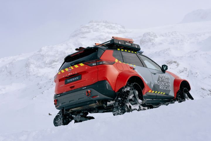 Rear of a Nissan X‑Trail Mountain Rescue facing backward in front of mountains