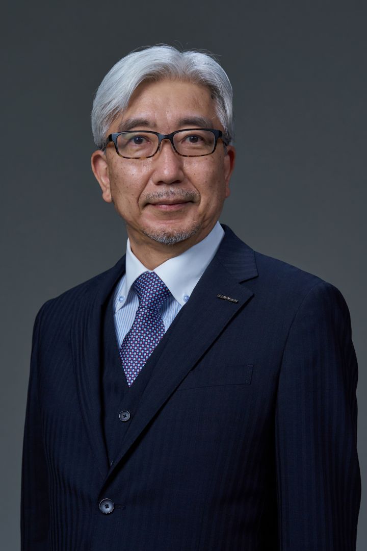 Portrait of Mitsuro Antoku (suit, tie and NISSAN corporate pin)