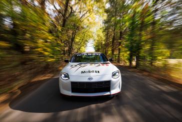 Front view of the 2022 NISMO Performance Parts Z driving down the road.