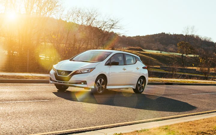 2022 Nissan LEAF driving left on the road