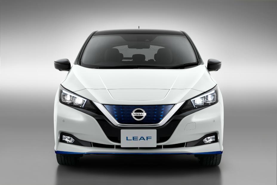 A head on view of a white Nissan LEAF